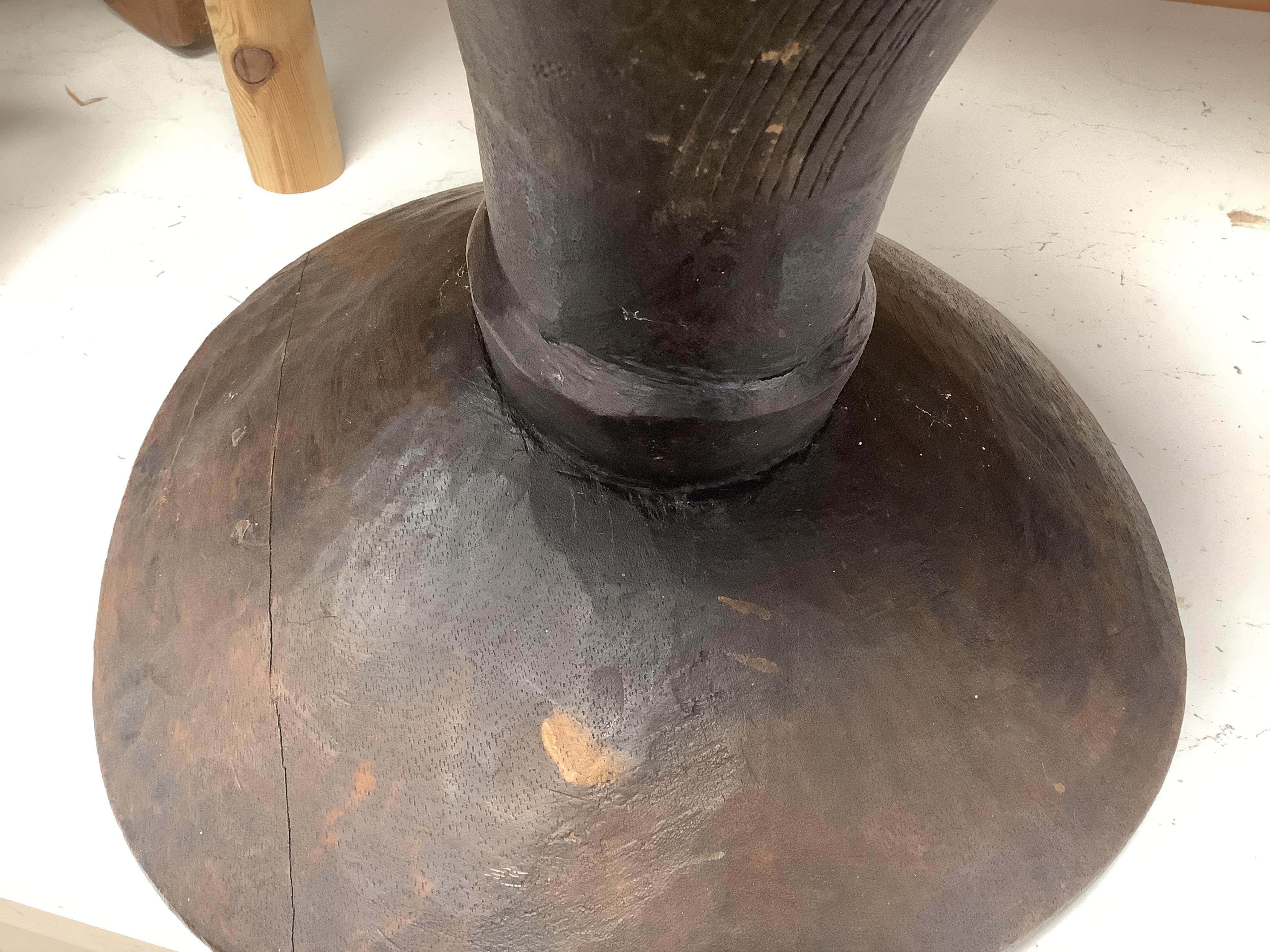 Two African tribal busts, two carved spoons and three carved Kamba Kenyan stools (11). Largest stool 28cm high. Condition - mostly good, some staining to seat of largest stool